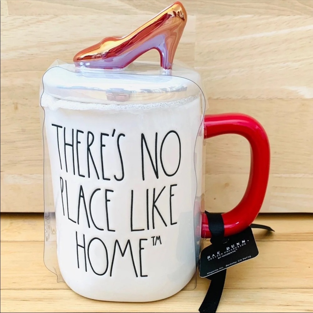 Brand new Rae Dunn THERE’S NO PLACE LIKE HOME w/ruby slippers topper mug.